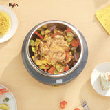 Hot pot with ingredients on a beige table, featuring the brand 'Kylin'.